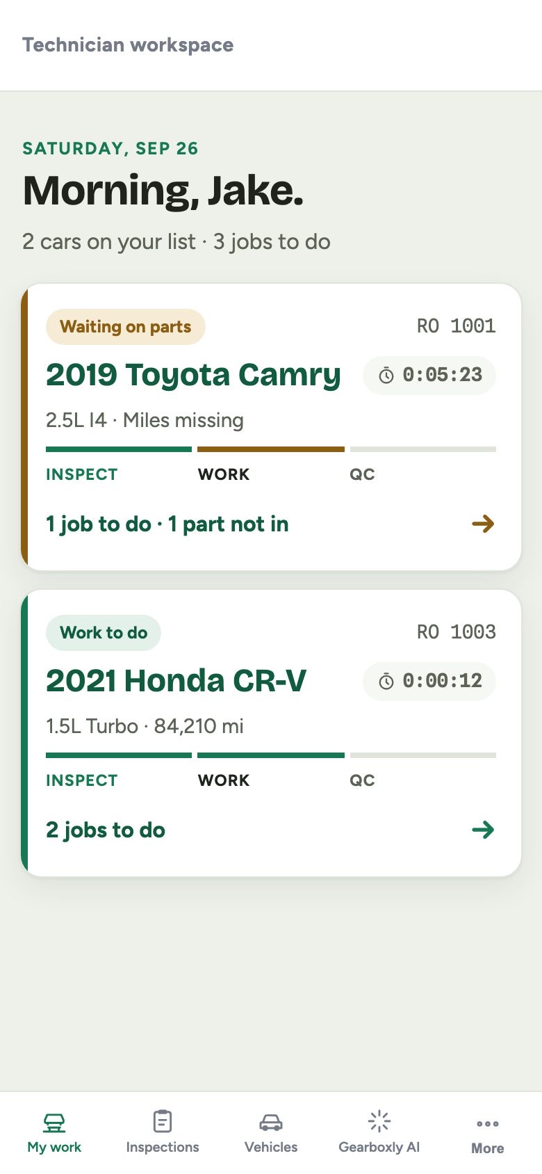 Gearboxly technician workspace on a phone showing two cars with job progress and timers